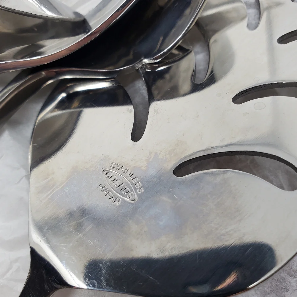 Cosmos Fresco Stainless flatware serving set of 4 In Excellent condition